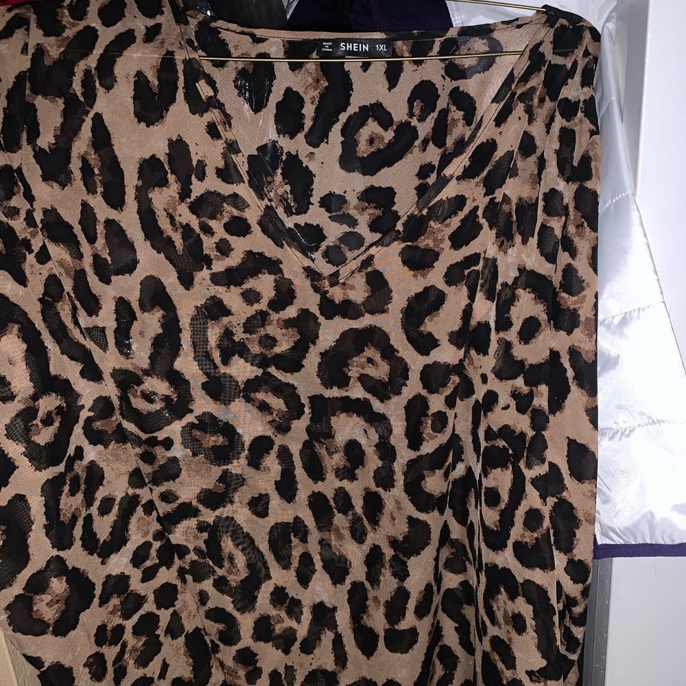 She in long sleeve cheetah print blouse